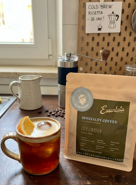 glass of cold brew with coffee bag